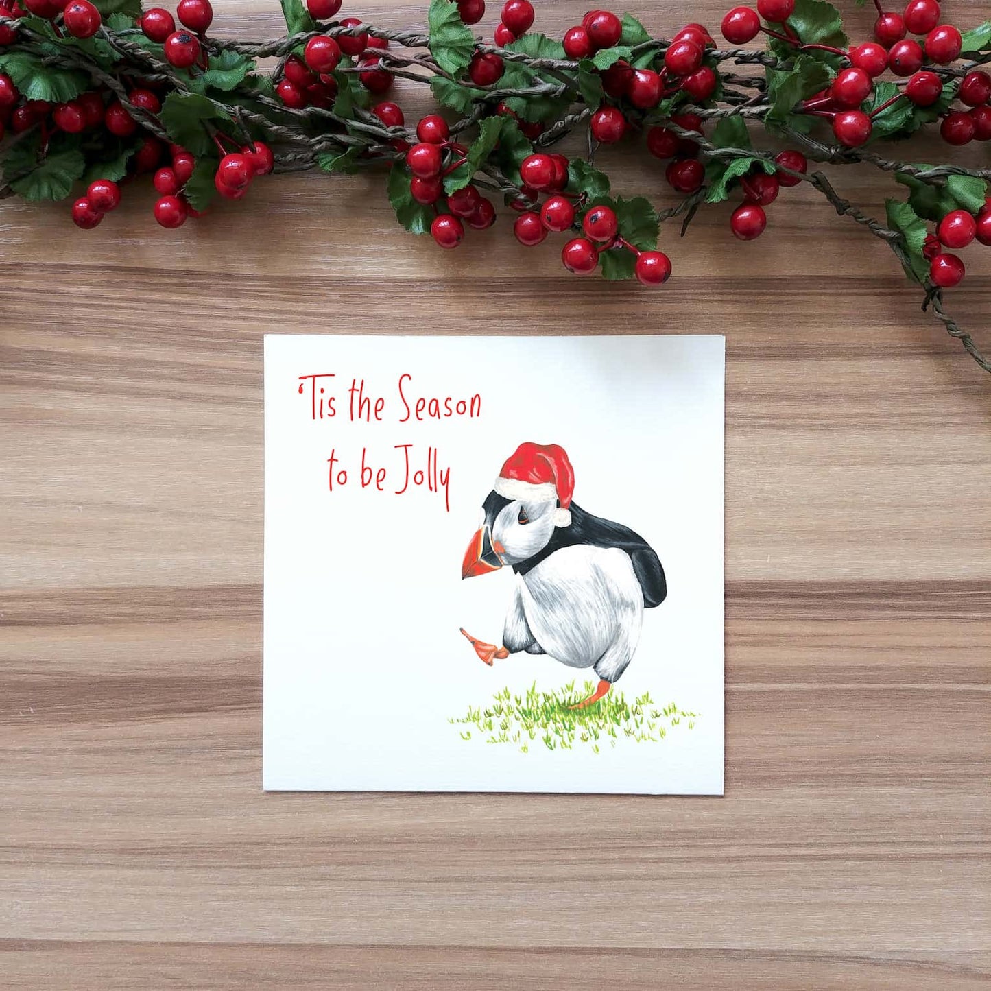 jolly puffin with Santa hat Christmas card