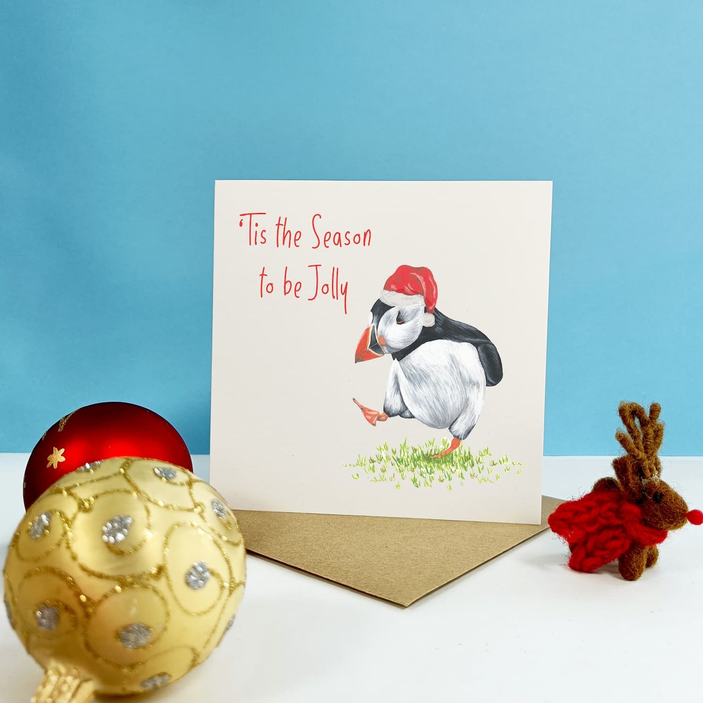 puffin with santa hat Christmas card with brown envelope
